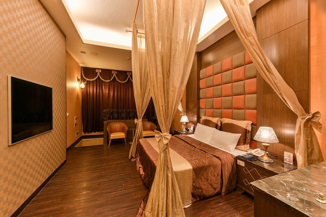 Hwu Meei Motel Tainan Extérieur photo